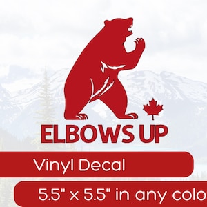 May include: Red vinyl decal of a bear with the text "Elbows Up" and a Canadian flag. The decal is 5.5 inches by 5.5 inches.