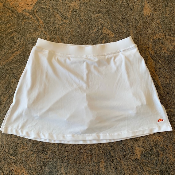 White vintage Ellesse tennis skirt with white shor