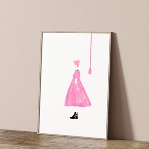 Puede incluir: Una impresi&oacute;n art&iacute;stica enmarcada que presenta una ilustraci&oacute;n estilizada de una figura con un vestido rosa y botas negras. Una gota de pintura rosa se extiende desde la parte superior. La obra de arte est&aacute; sobre un fondo neutro.