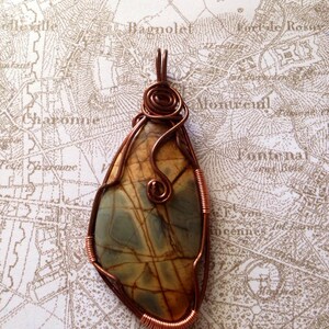 Desert stone with copper wrapping