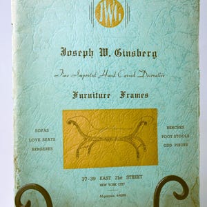 May include: A vintage catalog cover for Joseph W. Ginsberg, featuring a light blue textured background with gold lettering and a gold illustration of a furniture frame. The catalog lists furniture types like sofas and benches.