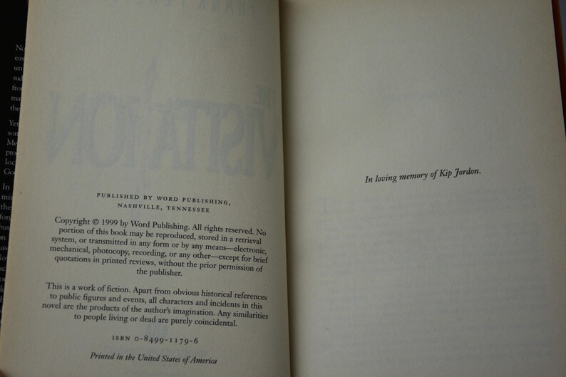 May include: Open book pages with text. The left page states the publisher, copyright information, and ISBN. The right page reads "In loving memory of Kip Jordon."