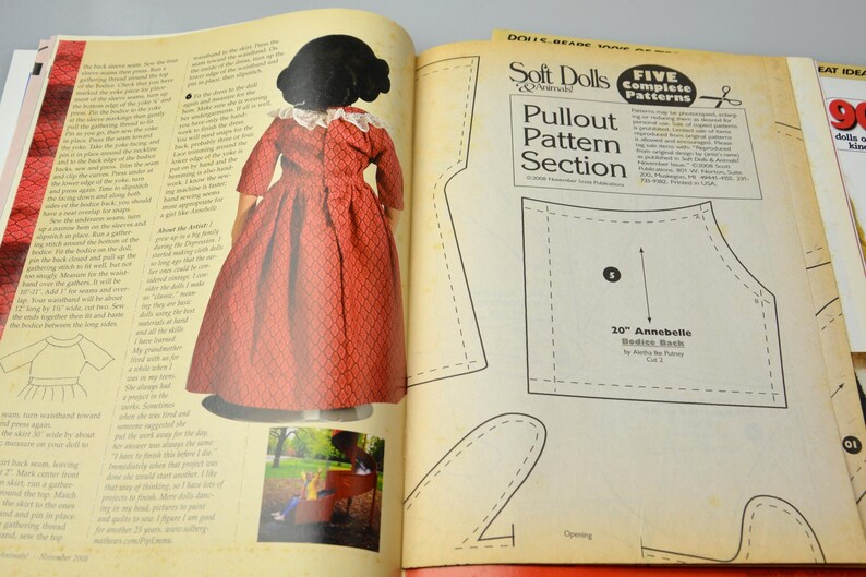 May include: A magazine page with a pull-out pattern section for a 20-inch Annebelle doll. The pattern is for a bodice back. The magazine also features a photo of a red dress on a doll.