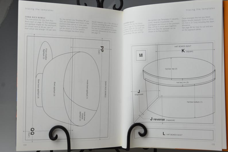 May include: Open book with diagrams for tracing templates. The left page shows a hat shape with labels like "Door side applied (2)". The right page has a hat box diagram with measurements and labels like "flat box top (2)".