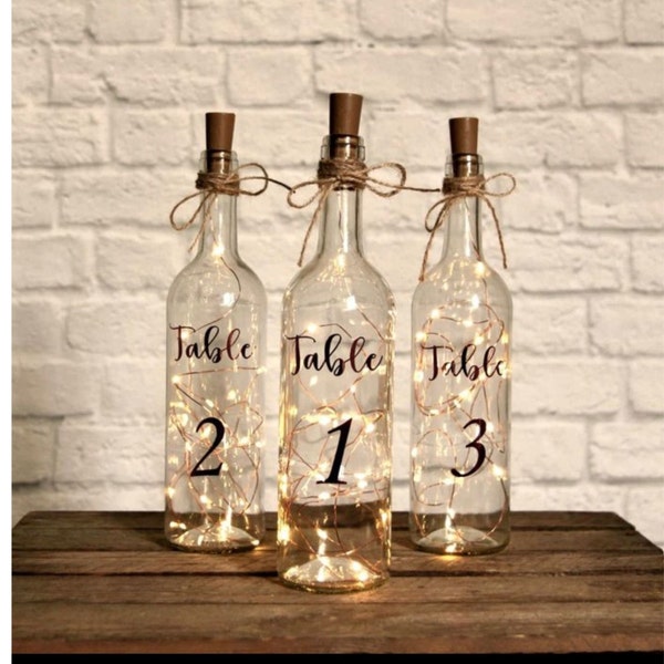 Lighted Wine bottles /Lighted bottle table number / Lighted Wedding Wine bottle centerpieces/ table number centerpieces/bottle centerpieces