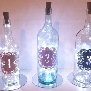 Wedding Wine bottles 1-10 Centerpieces with table number and cork lights/ Wedding Wine bottle centerpieces/ table number centerpieces/