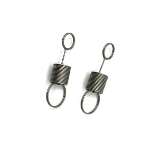 May include: A pair of silver spring earrings with a small loop at the top and a coiled spring in the middle.