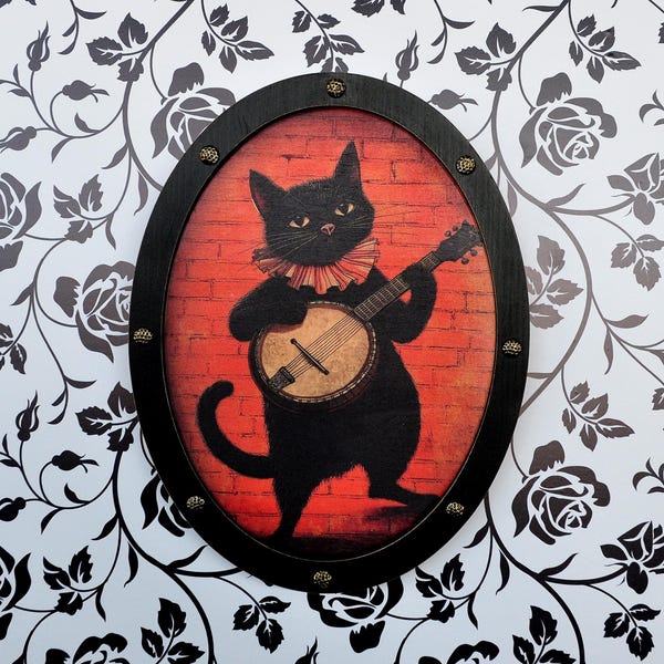 Black Cat with Banjo Wall Art - Whimsical Oval Frame Decor with Gothic Accent - Handcrafted Musical Cat Design for Cozy and Unique Home