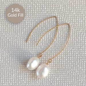 Long pearl earrings with baroque pearls: gold earrings made of 14k gold fill