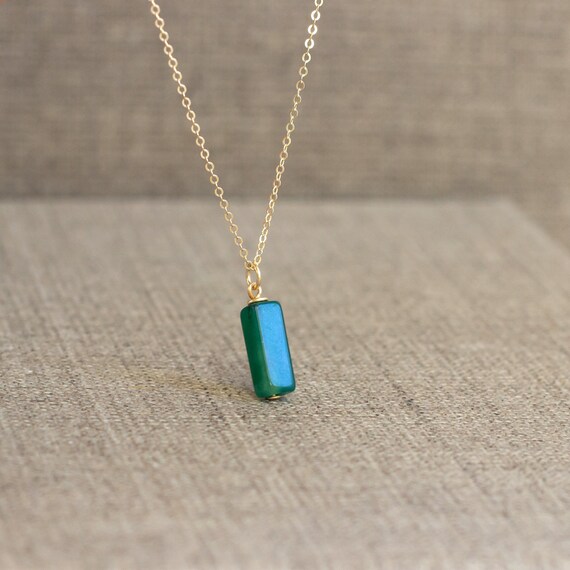 Green gemstone best sale necklace