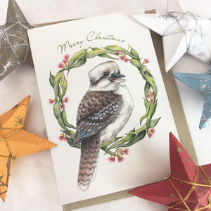 Carte de Noël australienne avec Kookaburra, animaux sauvages Couronne de Noël australienne feuilles de gomme oiseau fleurs Cartes de Noël Joyeux Noël oiseau qui rit