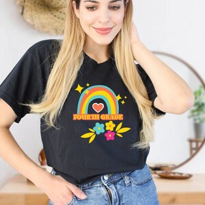Fourth Grade Retro Rainbow graphic teacher shirt