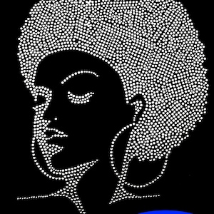 May include: White rhinestone iron-on design of a woman's face with closed eyes and large hoop earrings. The design measures 9 inches by 11 inches.