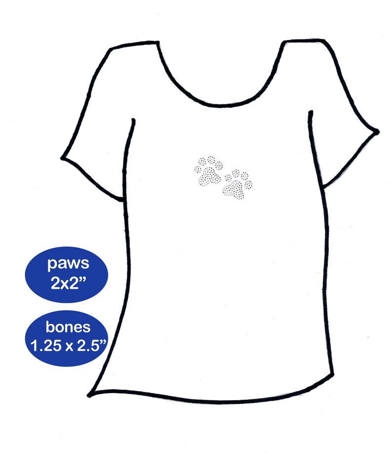 May include: White t-shirt with two paw prints in the center. The text "paws 2x2" and "bones 1.25 x 2.5" is written in blue circles on the bottom left of the image.