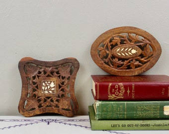 Pair of Carved Wooden Trivets