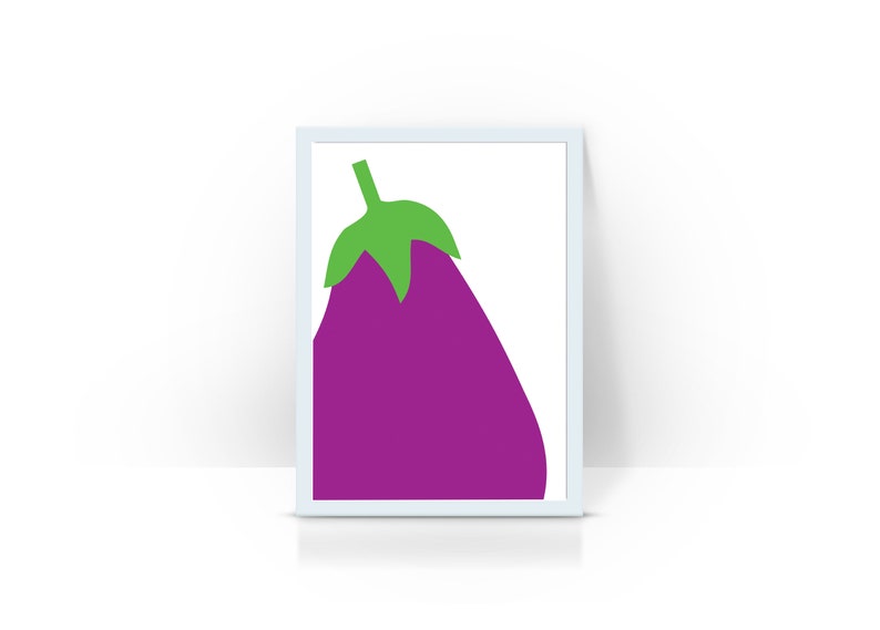 May include: A framed print of a purple eggplant with a green stem and leaves. The background is white.