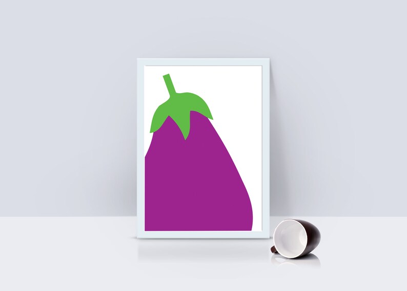 May include: A white framed print of a purple eggplant with a green stem on a white background.