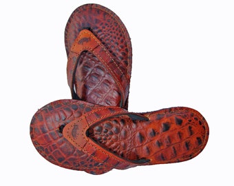 Leren teenslippers met alligator-reliëf voor dames