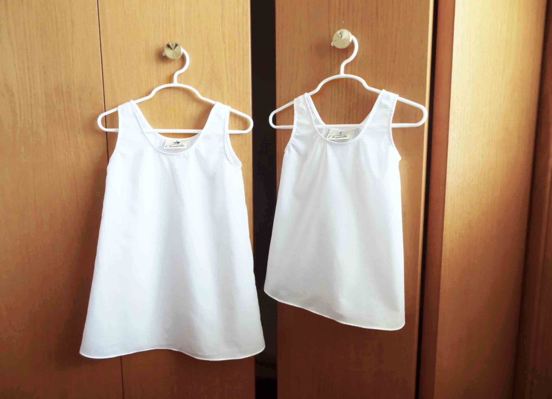 girls white slip ons