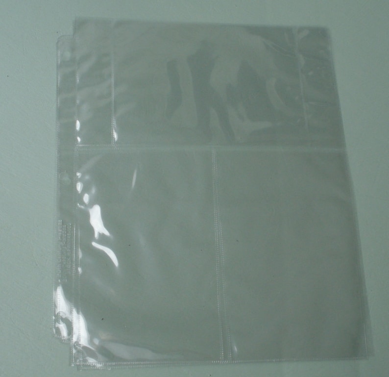 Puede incluir: Protectores de p&aacute;gina de pl&aacute;stico transparente con cuatro bolsillos individuales para guardar tarjetas u otros art&iacute;culos.