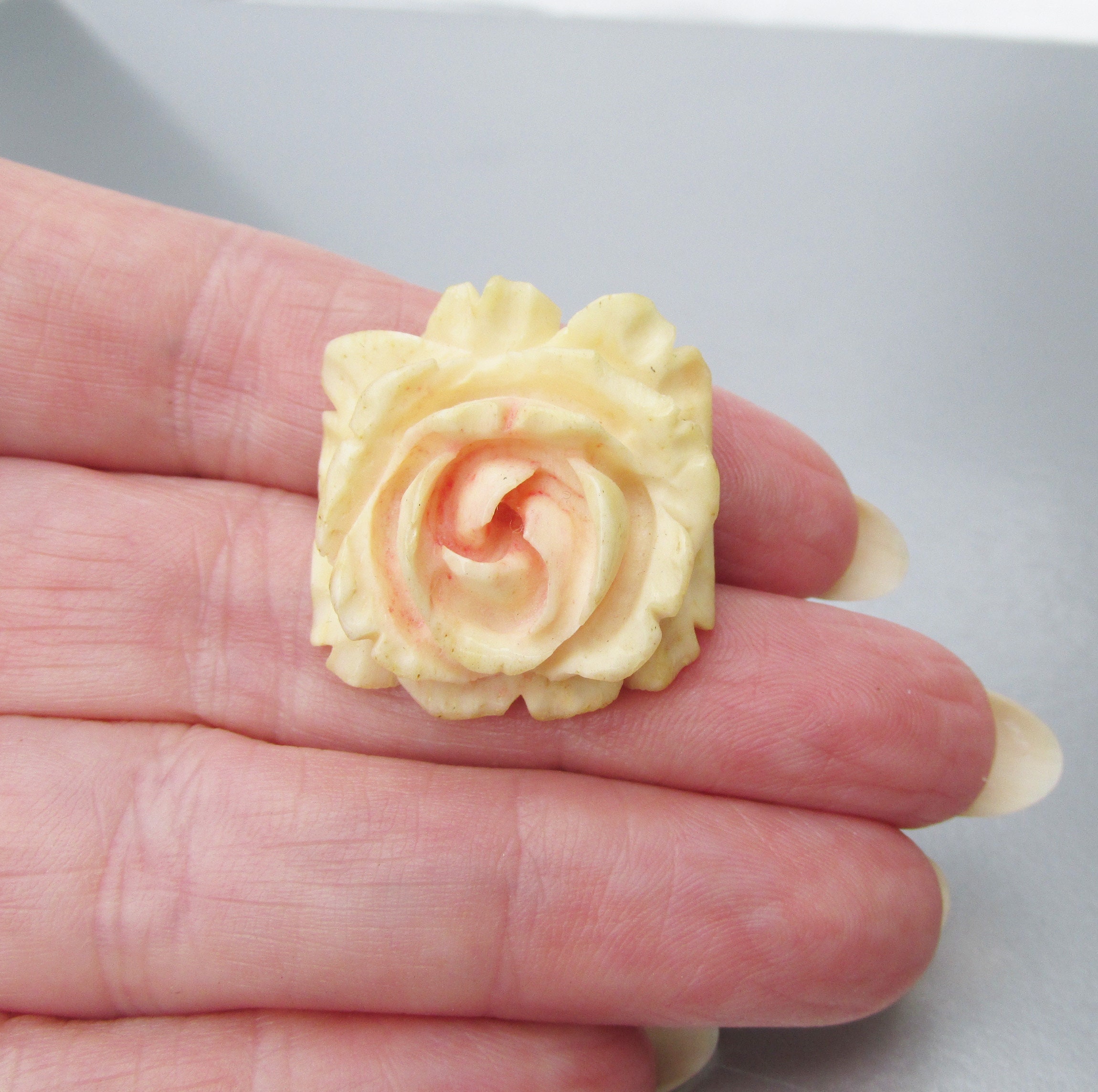 Ivory brooch deals