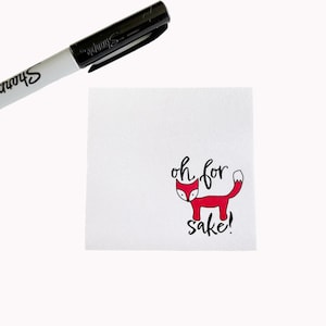 Peut inclure: Une carte blanche avec une illustration de renard rouge et le texte "oh for sake!" écrit en noir.