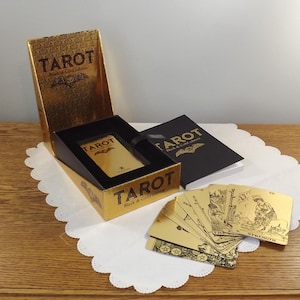 Coffret Tarot édition noir et or, jeu de cartes de tarot et manuel d'instructions