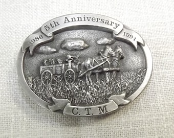 Canadian Toy Menia C.T.M. Belt Buckle for Western Canada's Farm Toy and Collector's Magazine 5th Anniversary