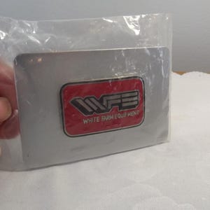 WFE White Farm Equipment Farmer Belt Buckle NOS