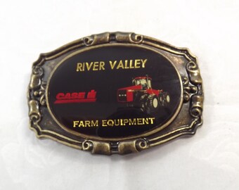 Vintage CASE IH Belt Buckle: River Valley Farm Equipment Advertising