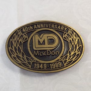 Vintage Brass MacDon 40th Anniversary Advertising Buckle for Agricultural Farming Equipment