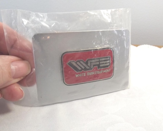 WFE White Farm Equipment Farmer Belt Buckle NOS