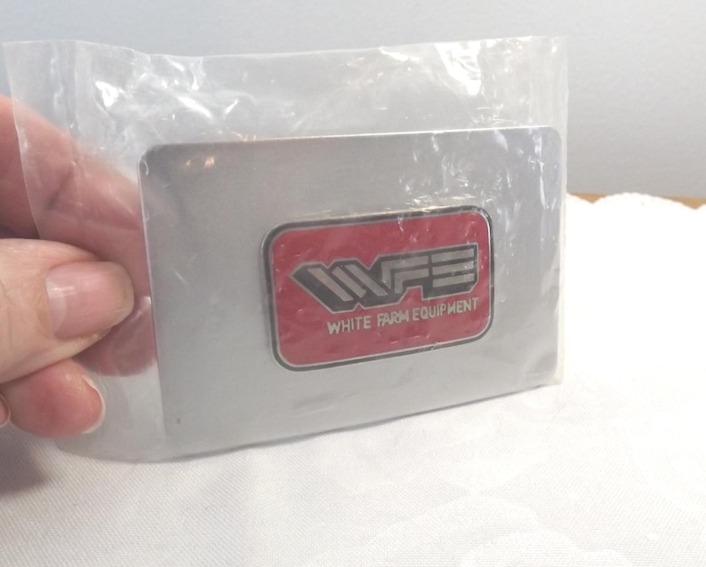 WFE White Farm Equipment Farmer Belt Buckle NOS image 1