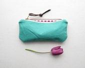 Jade/hot pink pencil case/cosmetic bag/bag tidy/clutch. Washed canvas & cotton stripes with a leather puller and brass YKK zip.