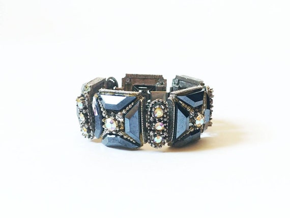 Lot de deux bracelets en métal argenté vintage