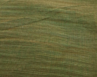 Textured Khadi Fabric in Green color sold by yard