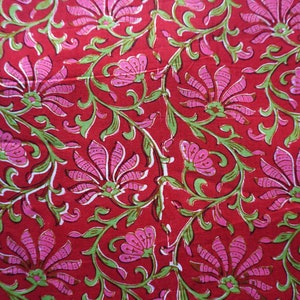 Maroonish red block print floral cotton fabric with border