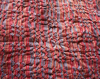 Hand ruched fabric made from yarn dyed woven fabric