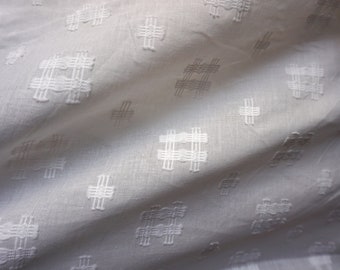 White abstract motifs woven cotton fabric sold by yard