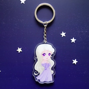 Clear acrylic keychain 6cm with silver ring of Amalthea (The Last Unicorn).