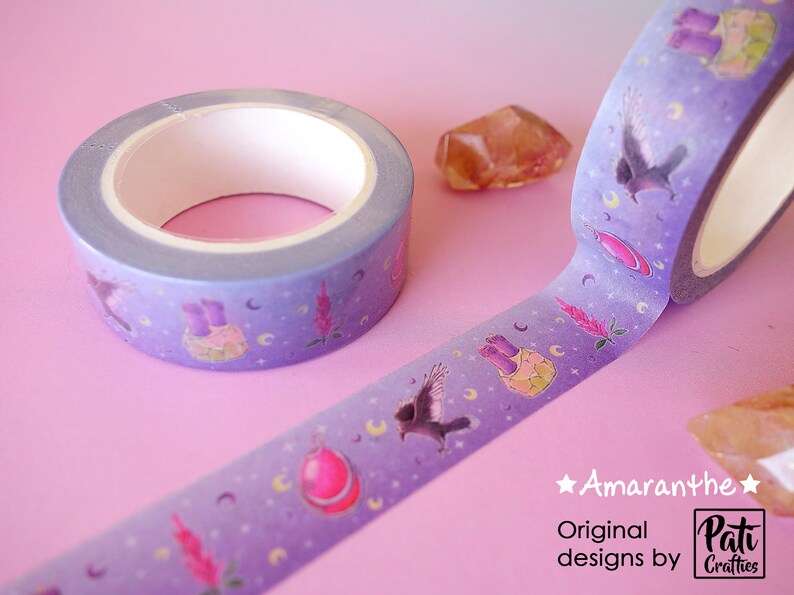 Washi tapes with a pattern of Dungeons and Dragons elements on a purple background: amulet, crows, flowers and moons, etc