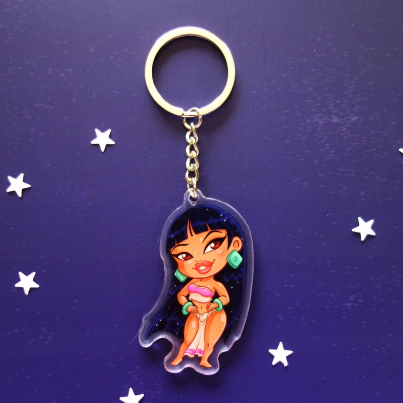 Clear acrylic keychain 6cm with silver ring of Chel (Road to El Dorado).