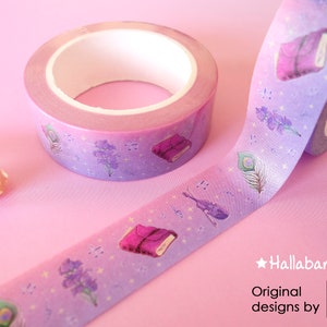 Washi tapes with a pattern of Dungeons and Dragons elements on a purple background: book, violin, feather, flowers, etc