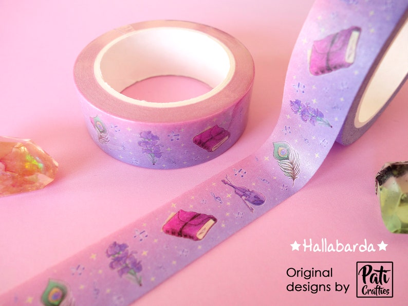 Washi tapes with a pattern of Dungeons and Dragons elements on a purple background: book, violin, feather, flowers, etc