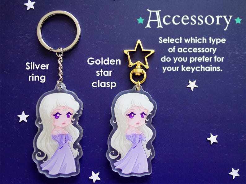 May include: Two keychains with a cartoon illustration of a woman in a purple dress. One keychain has a silver ring, the other a golden star clasp. The text reads "Accessory" and "Select which type of accessory do you prefer for your keychains."