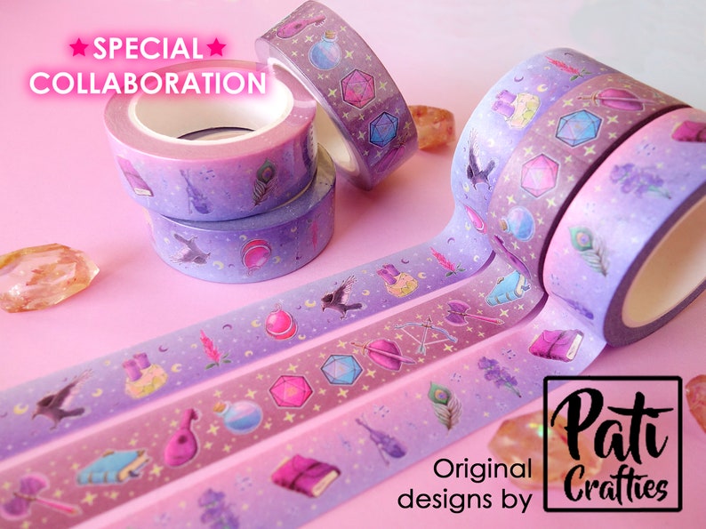 Washi tapes with a pattern of Dungeons and Dragons elements on a purple background. Three rolls are piled, and three are extended showing the patterns.