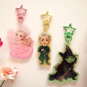 Breloczki do kluczy Zły Czarnoksiężnik z Krainy Oz Śliczne akrylowe zawieszki Glinda Elphaba Czarownice Magia Zachód Północ Zielony Różowy
