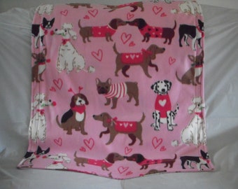 Doggy Blanket - adorable doggies with hearts, flowers and wearing sweaters print fleece with the same print on the reverse side