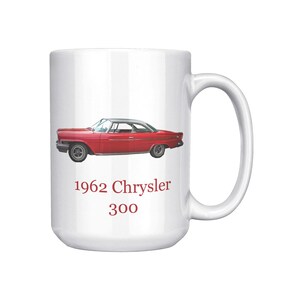 White ceramic mug with vintage 1962 Chrysler 300 photo and 'I'm not old, I'm classic!' quote. Reverse shows '1962 Chrysler 300' text. Options: black, blue, pink, or red handle/interior.