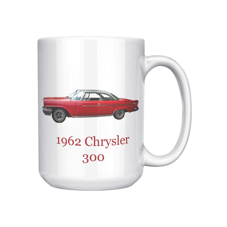 White ceramic mug with vintage 1962 Chrysler 300 photo and 'I'm not old, I'm classic!' quote. Reverse shows '1962 Chrysler 300' text. Options: black, blue, pink, or red handle/interior.